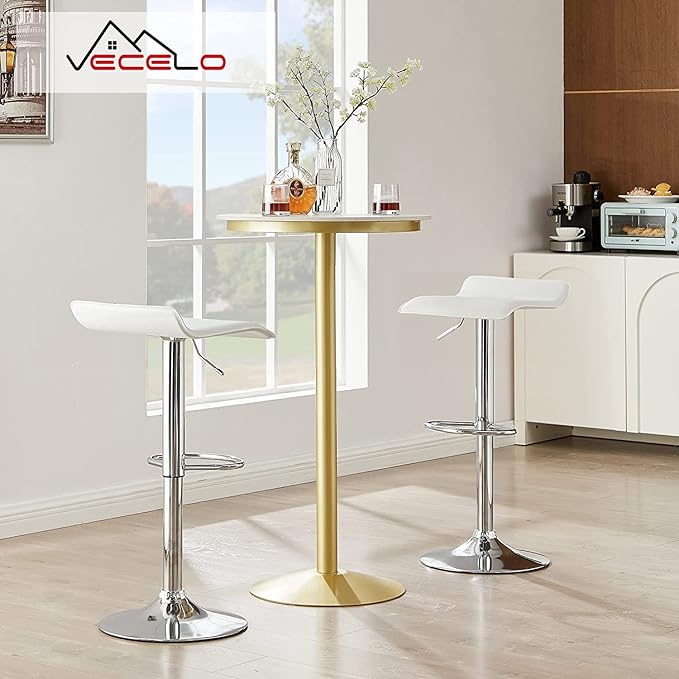 Mesa alta con taburetes